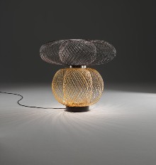Barcelona-based Parachilna launched a line of lighting that focuses on luxury by utilizing the best skilled craftsmen left in Europe and around the world