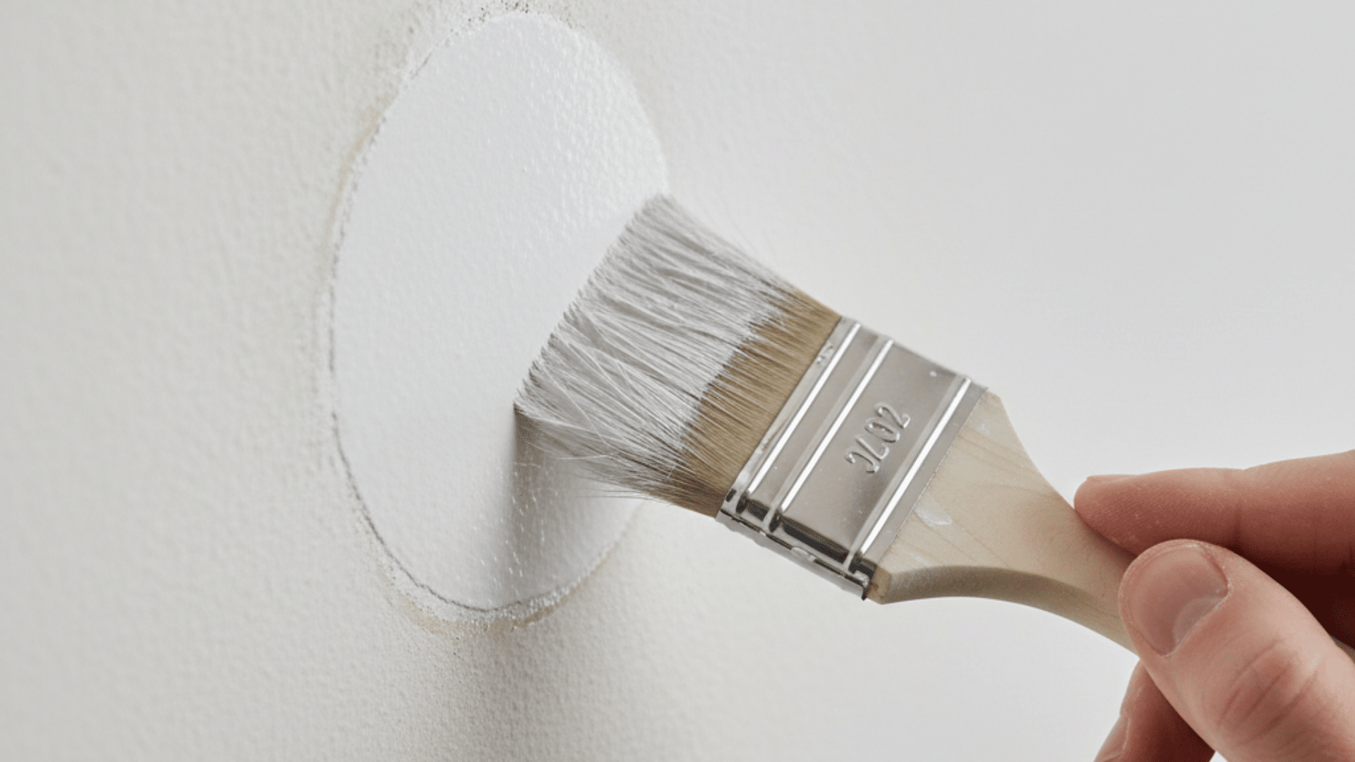 Applying primer to the repaired area