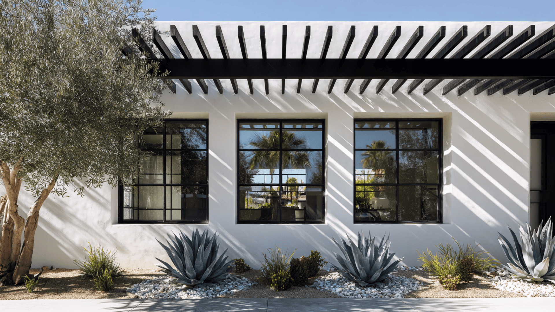 Black Metal Awnings Over Front Windows