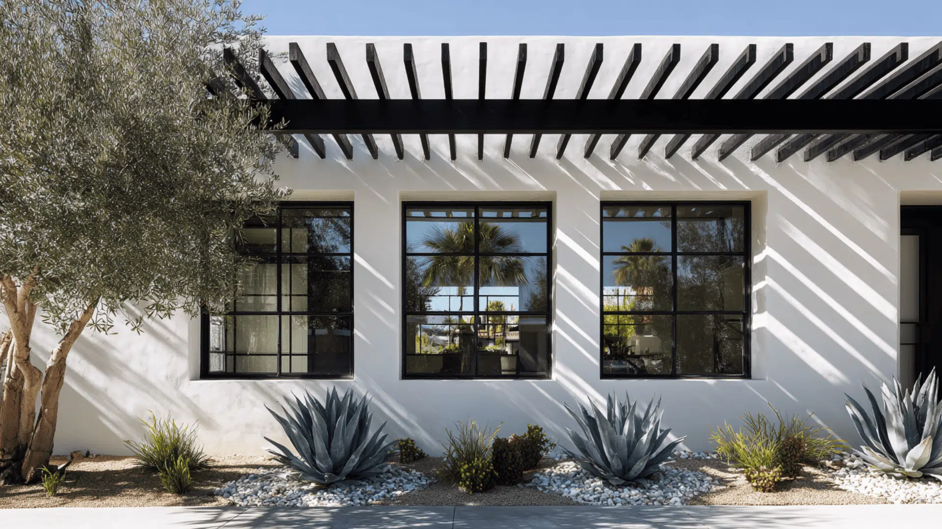 Black Metal Awnings Over Front Windows