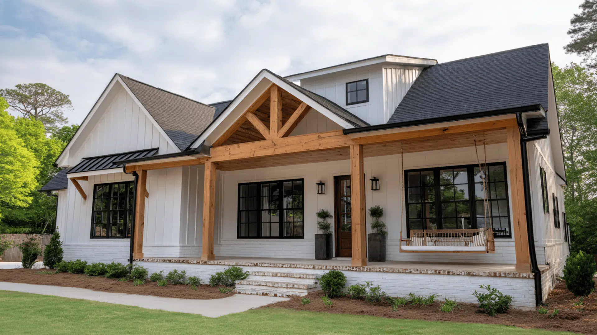 _Farmhouse Feel Black Windows Wood Beams Simple Porch Swing
