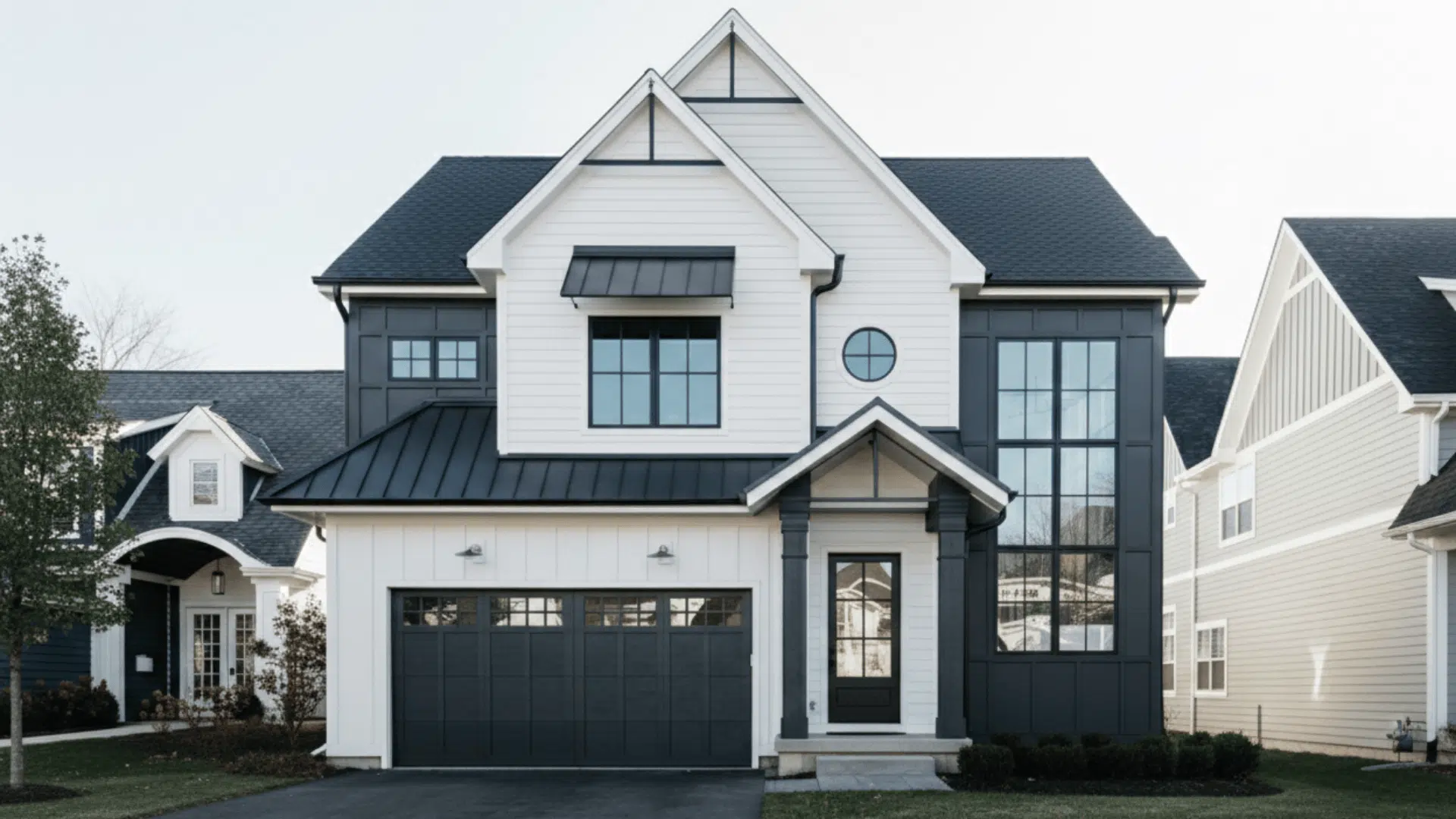 a classic white house with black trim