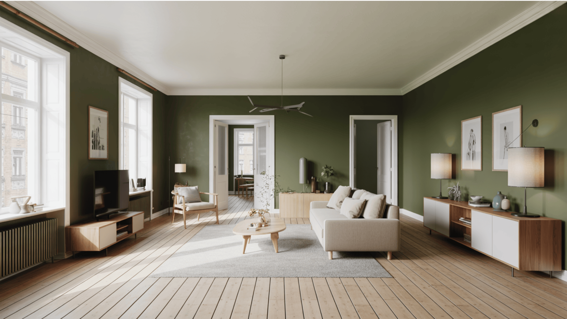 Cozy living room with blonde wood floors and rich green walls.