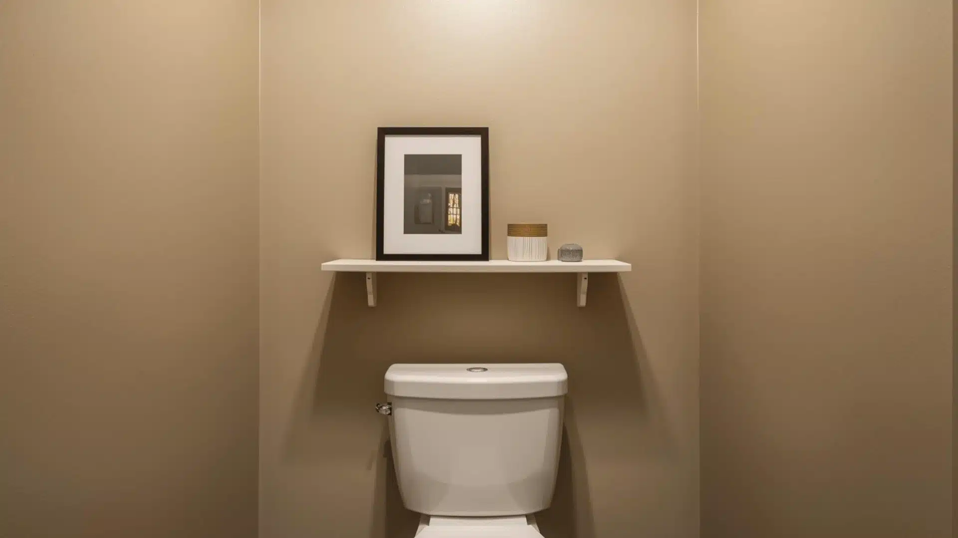 Narrow Picture Ledge Styled Above Toilet