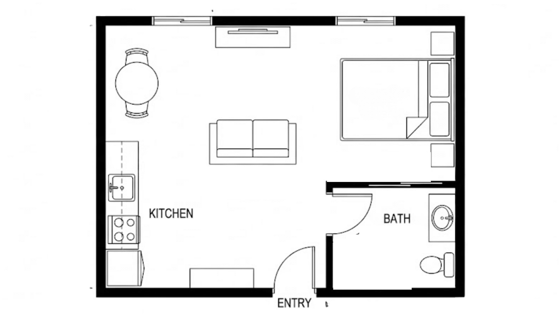 Floor plan of a studio apartment, showcasing the layout of living, sleeping, and kitchen areas in a compact design.