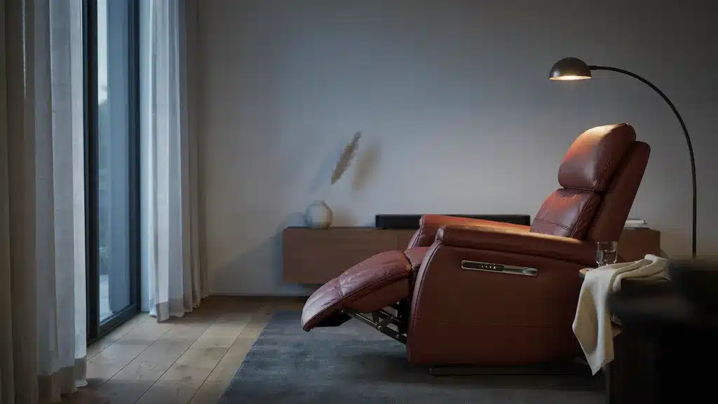 Massage recliner chair with built in vibration features in luxury room showing therapeutic seating setup.
